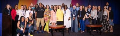 Members at NASW conference with Senator Stabenow